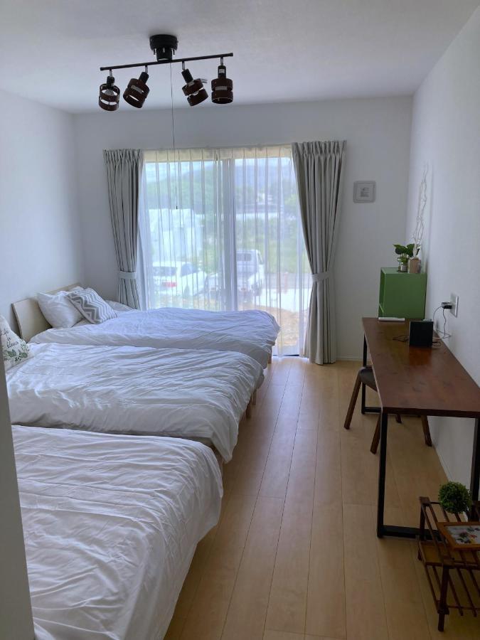 Nakijin Resort Guest House Exterior photo